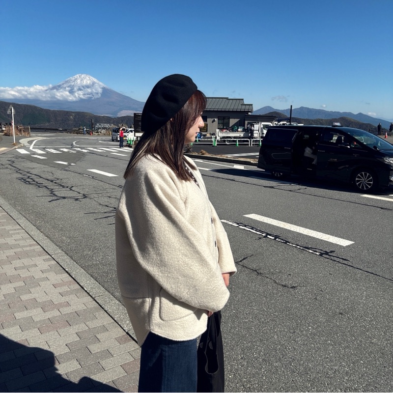 謝**