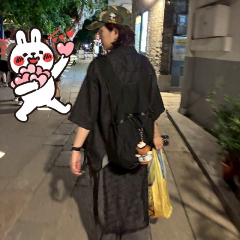 陳**