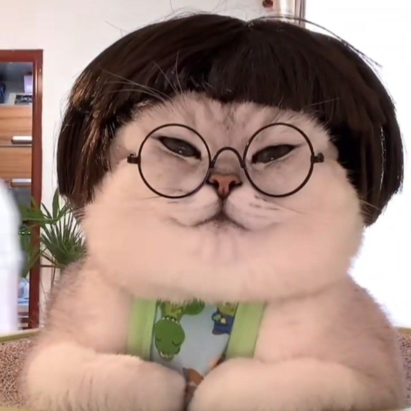 謝**