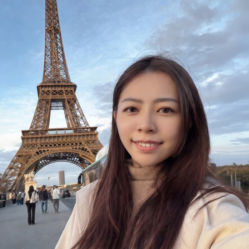劉**