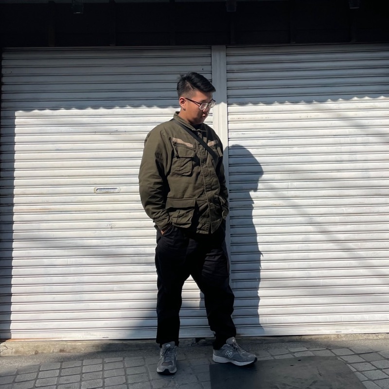 陳**