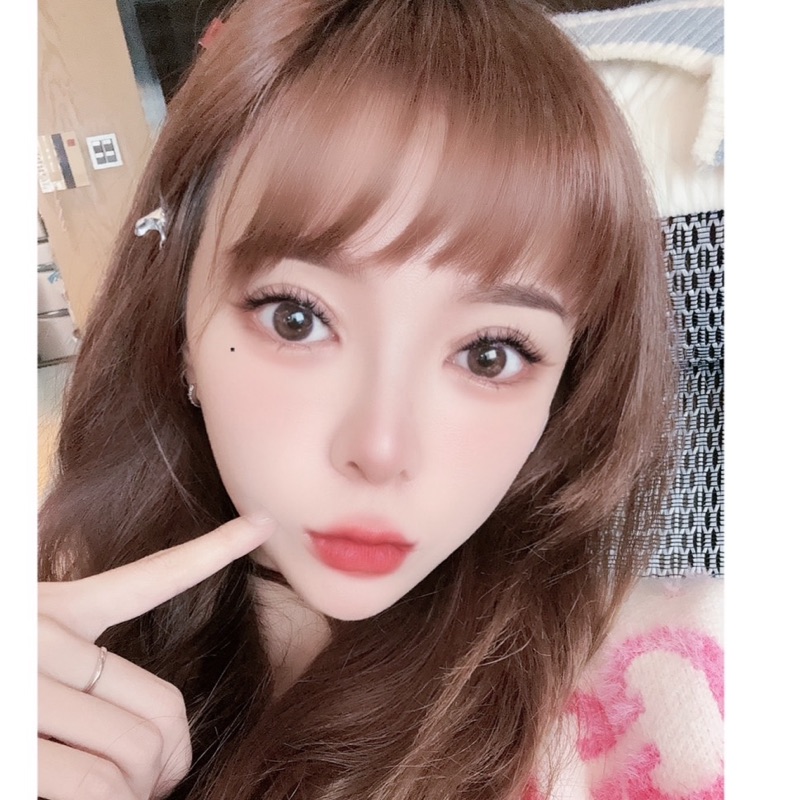 陳**